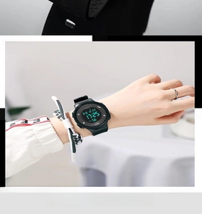 Wrist shot of a black digital sports watch showing 5ATM waterproof display and 17:25 time