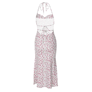 Close-up of the backless halter design with cross-straps on a floral midi dress