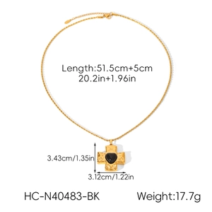 Detailed size specifications of the gold cross necklace with a black heart center gemstone