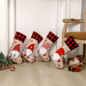 Set of 4 Nordic Christmas stockings with 3D gnome design in red and beige linen fabric