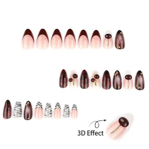 Faux ongles bordeaux de style français avec cerises 3D et motifs zébrures