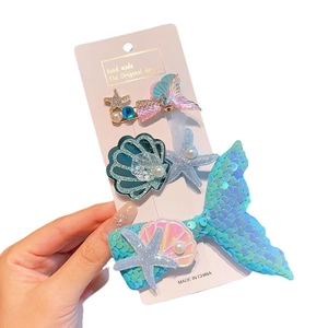 Lot de barrettes thème océan avec queue de sirène pailletée, étoile de mer et perles