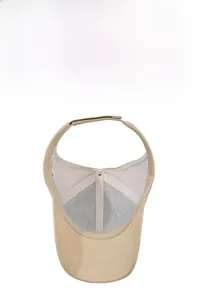 Detail view of breathable grey mesh lining and adjustable velcro strap on sun visor hat