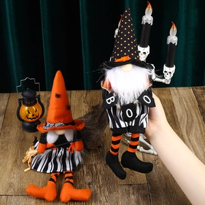 Handcrafted Halloween plush gnomes with orange witch hats and BOO detail decorations