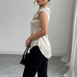 Satin one shoulder sleeveless top for women in champagne with elegant drape and side zipper