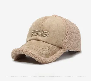 Detail view of winter baseball cap with lamb wool拼接 and FBXS letter embroidery