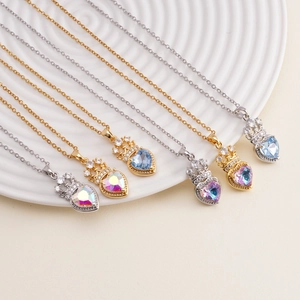 Elegant heart crown pendant necklaces in gold and silver with colorful crystal stones