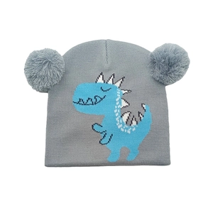 Berretto grigio in maglia per bambini con pompon e simpatica fantasia di dinosauro invernale