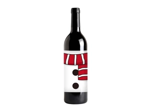 Detail of premium red wine bottle label with gold stamping and snowman festive design