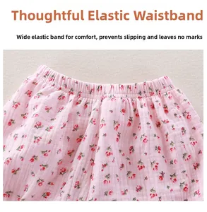Close-up of elastic waistband on breathable floral cotton gauze toddler pajama pants