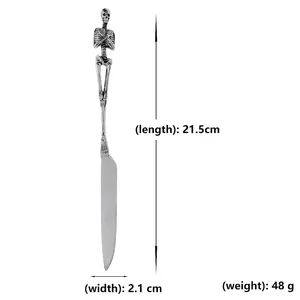 Gothic skull cutlery knife with dimensions 21.5cm length and detailed handle carving