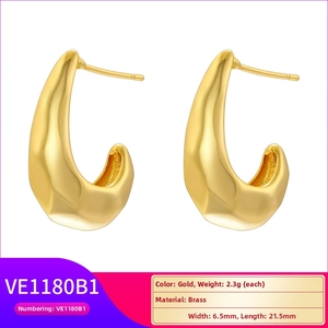 Detailed size and weight specs for gold-plated teardrop earrings made of brass