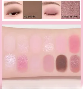 Arm swatches of 12-color eyeshadow palette showing matte and shimmer textures