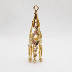Hollow gold flower bead spacer cap with tower design and polished finish for DIY jewelry