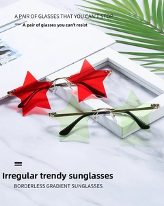 Detail view of red and green star-shaped rimless sunglasses with gold metal temples