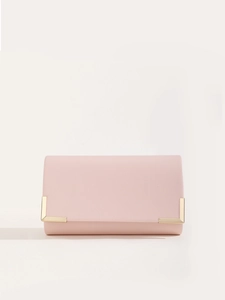 Detail of pink PU leather clutch showing golden metal corner protectors and matte texture