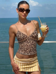 Women's sexy leopard print V-neck camisole top paired with a yellow striped beach skirt
