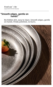 Detail of stacked vintage 304 stainless steel round plates on dark wood background