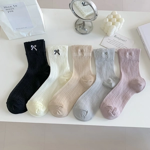 Five pack of ballet style mid-calf socks with bow embroidery and ribbed knit texture