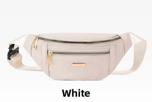 Close-up detail of white PU waist bag showing golden zippers and metal logo plate