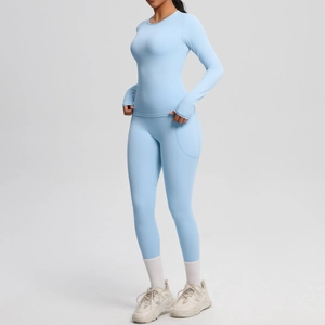 Ensemble de yoga bleu clair à manches longues avec legging taille haute et poches