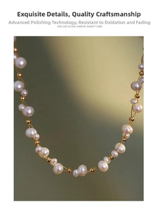 Detail shot of Baroque pearl and gold bead layered necklace with a French court style design