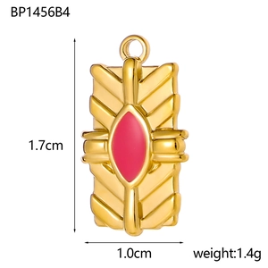 Detail showing dimensions of 1.7x1.0cm for the gold stainless steel red oval pendant