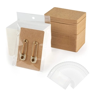 Brown kraft paper and white cardstock jewelry packaging set with clear adhesive bags