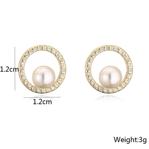 Detail showing 1.2cm gold earrings with micro-set zircons and elegant pearl accents