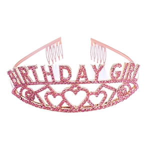 Detail of rose gold birthday girl crown featuring pink rhinestones and heart patterns