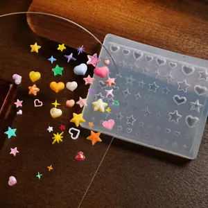 Detailed 3D silicone nail art mold showing various star and heart shapes for DIY manicures