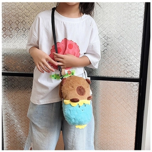 Kid wearing a cute brown plush Capybara crossbody bag with adjustable black strap