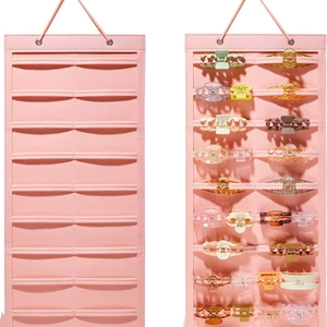 Pink felt hanging wall organizer for hair claws and clips with multi-tier storage