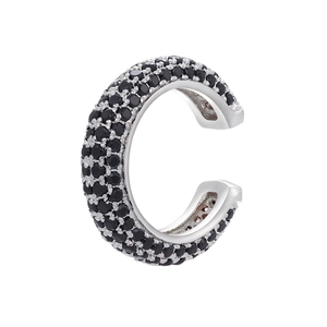 Close-up of a minimalist ear cuff with black cubic zirconia micro-pave in silver finish