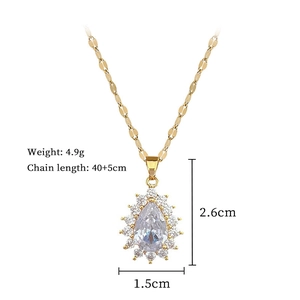 Detail of gold pear-shaped zircon pendant with dimensions 2.6x1.5cm on lip chain