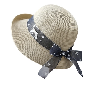 Summer beige straw sun hat for women with star print blue ribbon and bow detail
