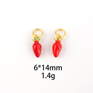Macro detail of strawberry fruit charm pendant in red enamel with 6x14mm dimensions