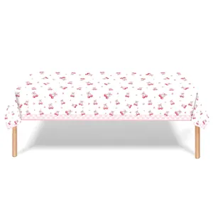 Rectangular cherry and bow print white tablecloth with pink gingham trim for party decor