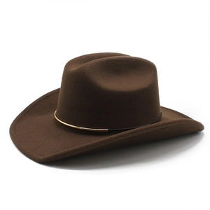 Close-up of brown wool felt cowboy hat with gold metal decorative belt and rolled brim