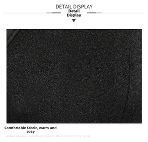 Detail of black fleece lining on a winter baseball cap showing thick thermal fabric texture