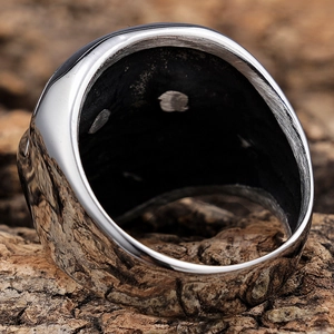 Retro stainless steel skull ring with vintage brushed texture and wide band design