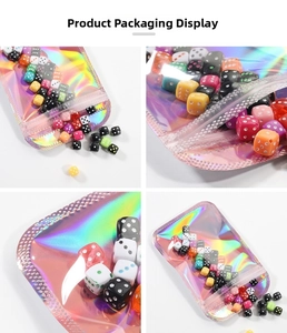 Rainbow holographic resealable bags showcasing colorful dice with high-gloss finish