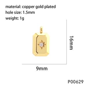 Detailed view of rectangular gold plated copper charm with starburst stone and dimensions