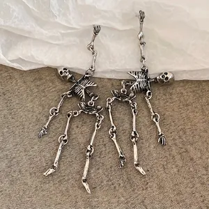 Gothic punk style vintage silver skeleton drop earrings set with movable bone joints
