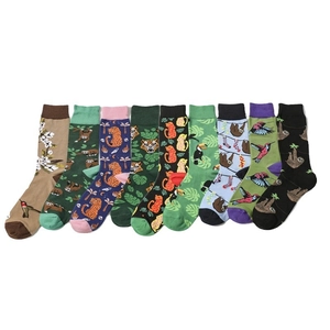9-pack animal print crew socks featuring leopard, tiger, sloth, and tropical nature designs