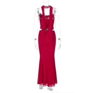 Detail of red mesh bodycon two-piece set with scarf top and long draped skirt