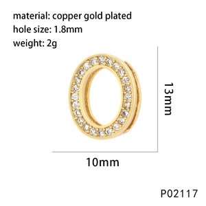 Detail view of gold-plated letter O pendant with white zircon showing exact dimensions