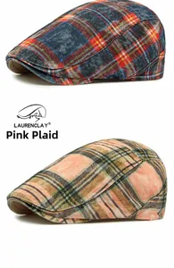 Detailed comparison of two vintage plaid ivy caps in blue and pink tartan cotton fabric