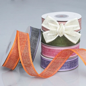 Close-up of wavy-edge burlap ribbons with fine weave texture for DIY Christmas bows