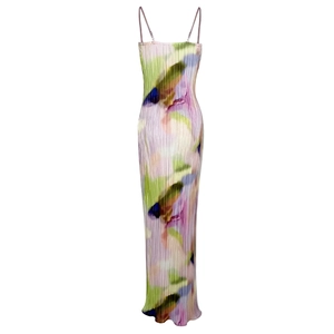 Detail of artistic pleated maxi dress featuring multi-color abstract watercolor print